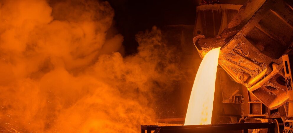 Iron ore getting poured to produce steel.