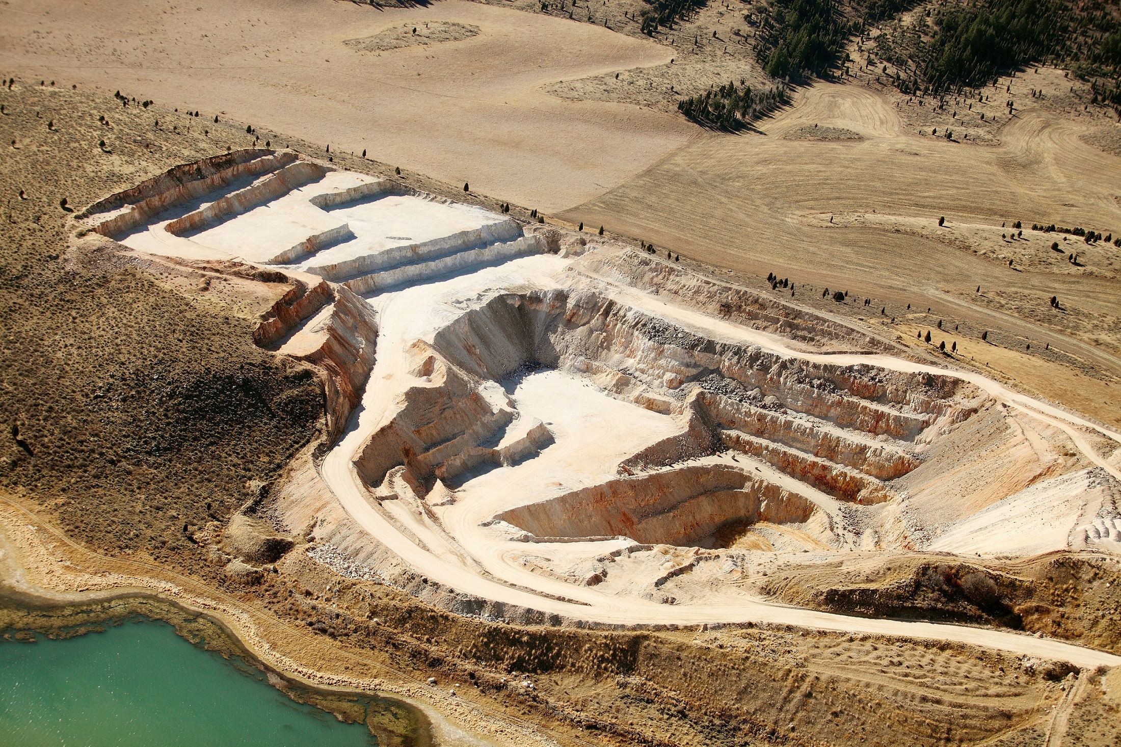 Aerial view of an open pit phosphate mine.