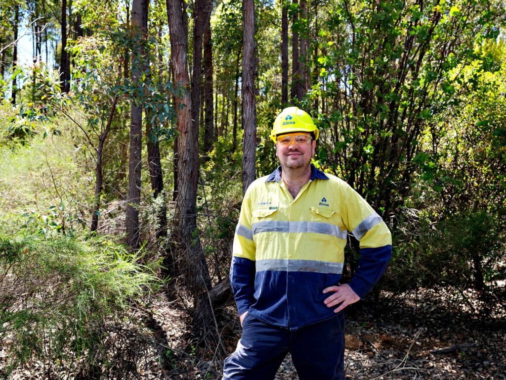 Environmental Improvement Specialist Cameron Blackburn plays an integral role in the return of native flora as part of Alcoa's extensive rehabilitation