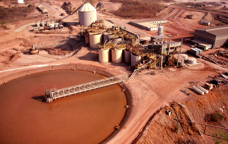 Aerial view of a tailings dam and processing plant in the Northern Territory.