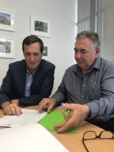 Graham Box of NTA (right) and former Queensland Government Minister for Mines and Natural Resources, Dr Anthony Lynham, discuss a significant decarbonisation project in the state.