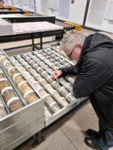 Oar Resources Exploration Manager Ross Cameron inspecting drill core during the tenure-wide review of Western Eyre Peninsula. These are not the samples sent to China.