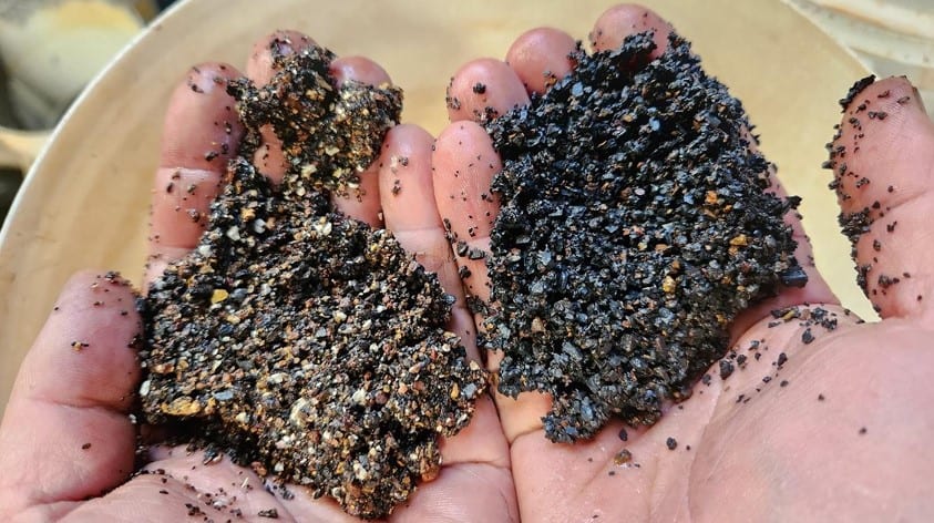 (Image source: Black Canyon) DMS separated material from KR1 showing beneficiated manganese ore on the right and waste on the left.