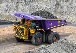 (Image source: Bravus Mining and Resources) A CAT 796 truck with its purple Peer Supporter tray in the pit at Carmichael mine. 