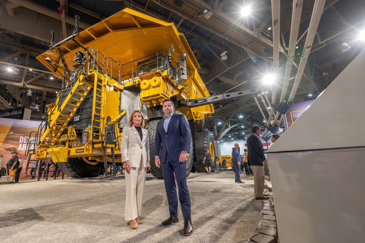 (Image source: BHP) Caterpillar group president Denise Johnson and BHP chief commercial officer Ragnar Udd in front of the Cat 798.