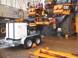 Aussie Mine boss steam cleaner working on-site at a PNG mine.