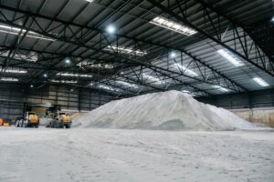(Image source: Liontown Resources) Spodumene concentrate stored at Geraldton Port Shed. 