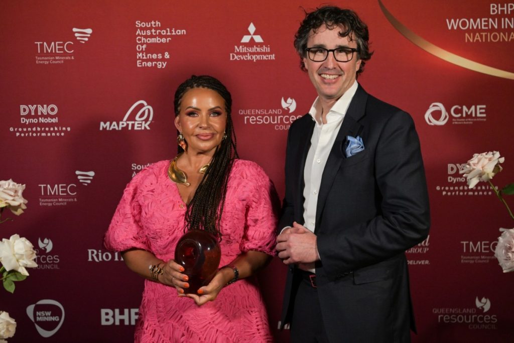 (Image source: Anglo American) Anglo American Workplace Support Manager Kanae Dyas won the Inclusion and Diversity Champion in Resources award at the 2024 Women in Resources National Awards in Canberra. She is pictured with Simon Trott from Rio Tinto (ASX: RIO), which sponsored the award.