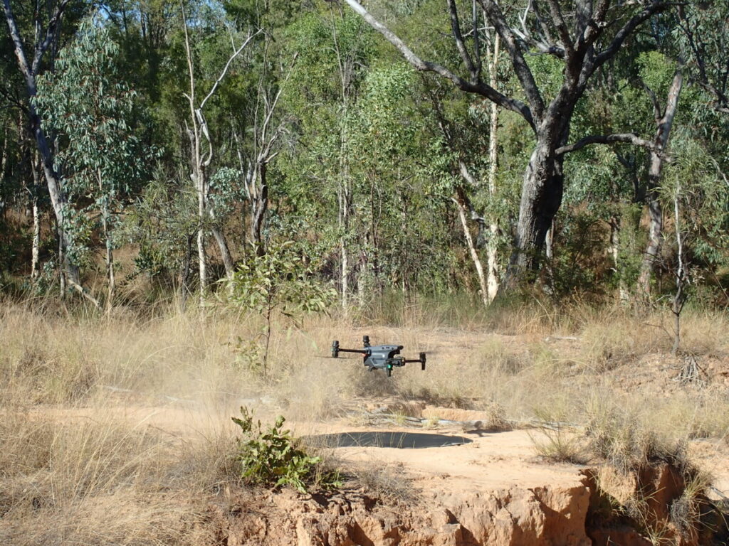 (Image source: Bravus Mining and Resources) Multispectral and thermal drone imagery of a spring showing changes in water temperature.