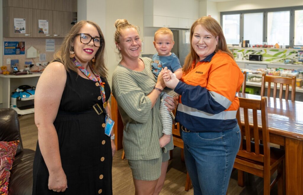 Ms Brown joins Ronald McDonald House Charities community engagement executive Narrisha McDougal (L), along with Shannara and Lucah, at the Ronald McDonald House Townsville Family Room. 