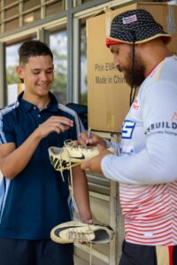 (Image source: Anglo American) Dolphins at Moranbah State High School.
