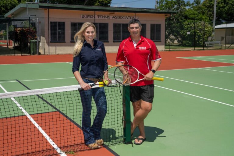 Bowen Tennis Association President Walter Morris and Bowen Rail Safety Coordinator Mandy Evans rally together at Bowen Tennis.