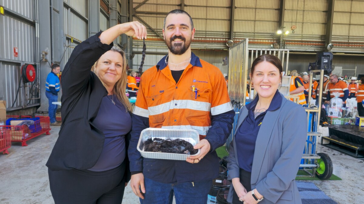 Dawson Mine maintenance technician Karl Nurser with Cancer Council Queensland acting statewide development manager Lisa Hearn and regional manager Bianca Lagaluga.