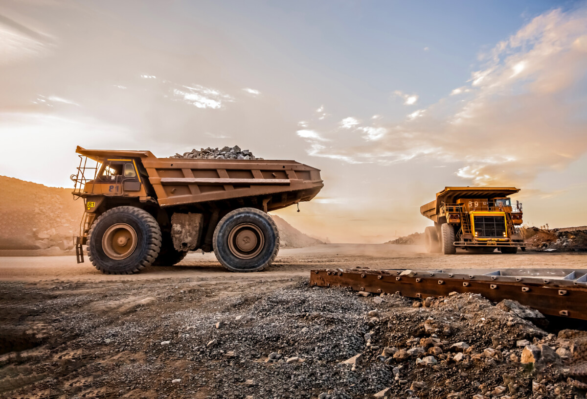 Dump Trucks transporting Platinum ore for processing
